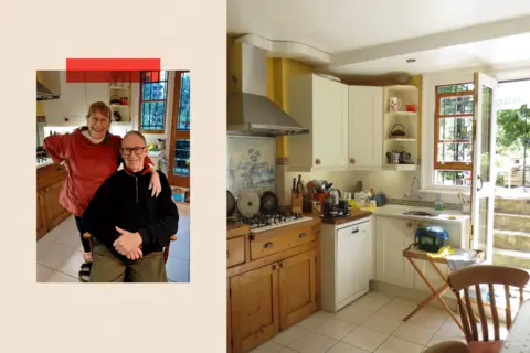 Why aren't they being used to solve shortages? Two Images: On the left a shot of Corina and her partner of 26 years, Roger. And on the right, a shot of her Kitchen.