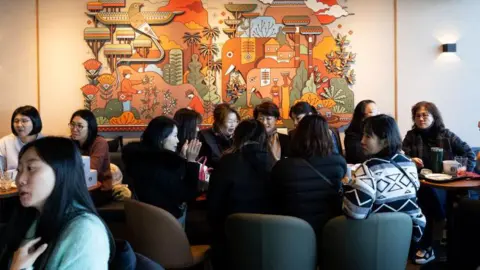 Starbucks tells customers in South Korea not to bring printers or PCs Getty Images A busy Starbucks cafe in South Korea