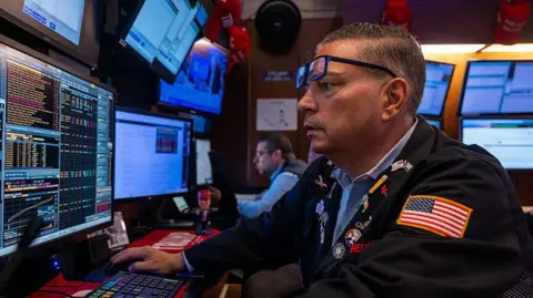 Trump says he will fire head of BLS as stocks shudder Getty Images Traders work on the floor of the New York Stock Exchange (NYSE) on July 30, 2025 in New York City.