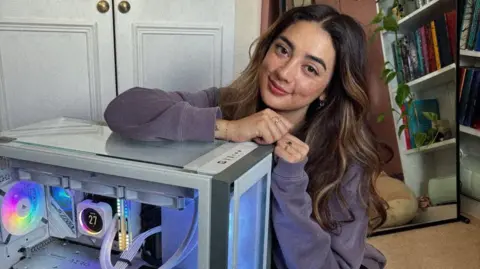 Twitch streamer Alyska and the female gamers defying stereotypes Alyce Rocha Alyce Rocha kneeling next to her PC at home. She has brown eyes and brunette hair, with blonde highlights