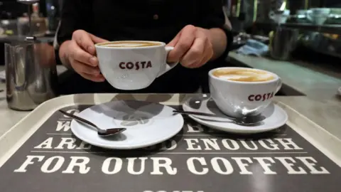 How coffee chains like Costa lost the matcha generation Getty Images A barista putting two white Costa Coffee cups filled with coffee on to white coasters on a Costa branded tray