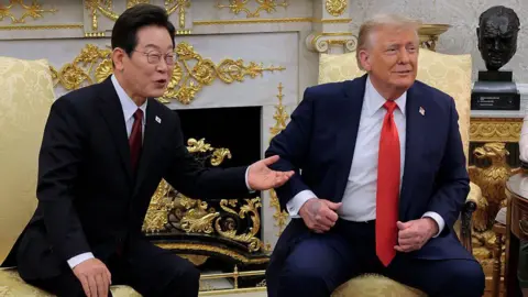 South Korea's Lee Jae Myung turns charm on during Trump meeting Getty Images Lee Jae Myung and Trump sitting side by side in yellow armchairs in the Oval Office. They are wearing dark coloured suits with red ties. They're looking and smiling in the same direction.