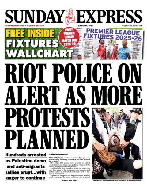 The headline on the front page of the Sunday Express reads: "Riot police on alert as more protests planned".