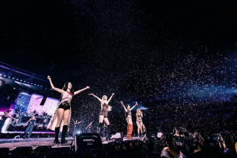 K-pop band make "epic Wembley dream" come true YG Entertainment Blackpink are showered in confetti as they play a concert on their Deadline World Tour