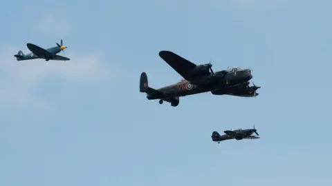 King hails veterans' courage and sacrifice PA Media Flypast by World War Two-era aircraft the Spitfire, Hurricane and Lancaster bomber