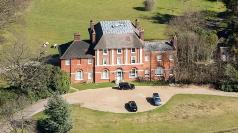 William and Kate set to move to new Windsor home Heritage Images/Getty Images An aerial shot of Forest Lodge in Windsor Great Park, showing a large redbrick country manor house with pillars and cars parked out the front.