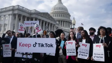 Trump's deal may be close but what's in it for China? Getty Images People gather for a press conference about their opposition to a TikTok ban on Capitol Hill in Washington, DC on March 22, 2023.
