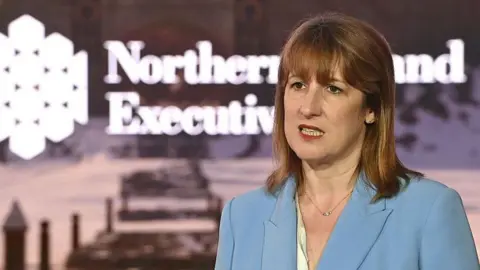 UK borrowing costs hit 27-year high adding to pressure on Reeves Getty Images Rachel Reeves wears a blue suit as she addresses a conference in Northern Ireland