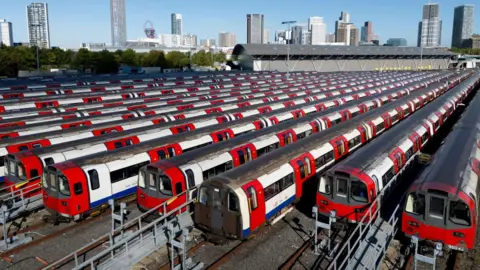 London Tube strike enters third day with more disruption reported EPA An aerial view of several Tube trains stationary, parked at a depot.