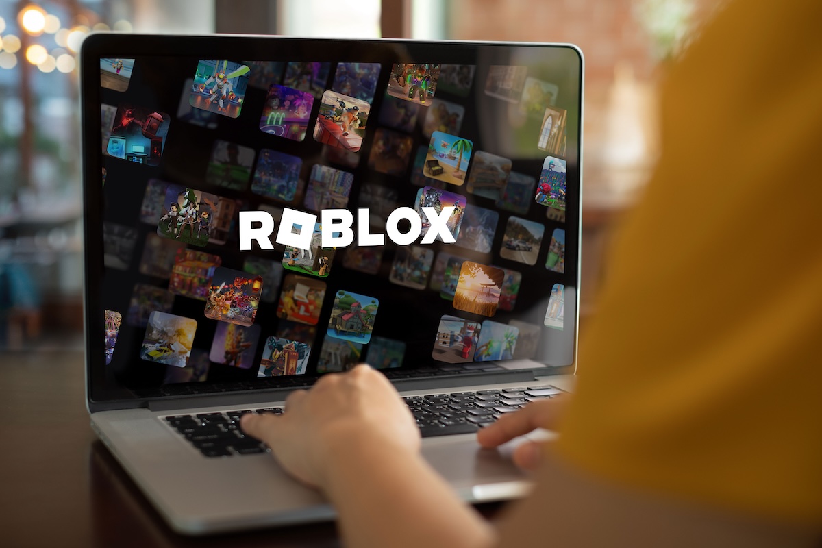 Roblox wallpaper on a users laptop Roblox expands use of age estimation tech and introduces standardized ratings