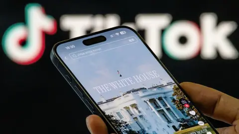 Trump's deal may be close but what's in it for China? Getty Images In this photo illustration, a smartphone screen displays a video of the White House on TikTok after the US presidential office launched its official account on the short-video platform