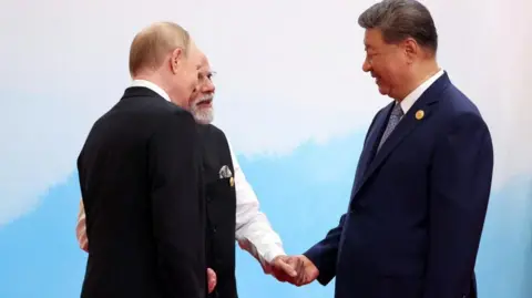 How oil has brought China, Russia and India closer together Reuters Russian President Vladimir Putin, Indian Prime Minister Narendra Modi and Chinese President Xi Jinping speak during a meeting at the Shanghai Cooperation Organisation (SCO) summit in Tianjin, China on 1 September, 2025.
