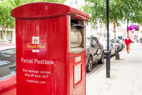 Royal Mail returns a profit for first time since 2022 Getty Images A red Royal Mail postbox. It reads: 'Parcel postbox. Buy postage online, drop off here 24/7. royalmail.com'
