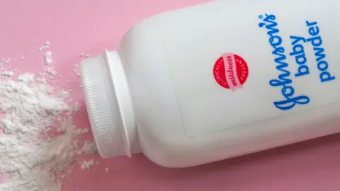 Thousands sue company alleging it hid talcum powder cancer risks Alamy Johnson's baby powder - Johnson & Johnson baby powder with contents spilled set on pink background