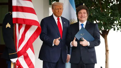 The US bet big on Argentina bailout Getty Images US President Donald Trump (L) and President of Argentina Javier Milei make the thumbs up sign standing at the White House on October 14, 2025