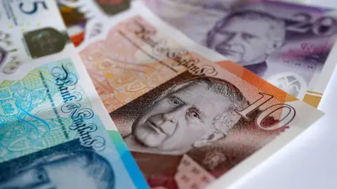 'Flawed' HMRC system stops hundreds of NI families' child benefit PA Media Three Bank of England bank notes. One is a blue five pound note with King Charles III on it, in the middle is an orange ten pound note with King Charles III on it and lastly is a purple twenty pound note with King Charles III on it.