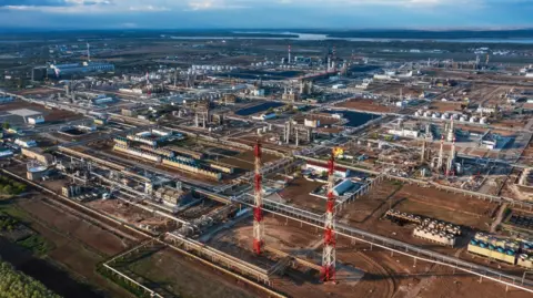 What do US sanctions against Russian oil companies mean for the war in Ukraine? Reuters A general view shows the oil refinery of the Lukoil company in Volgograd, Russia.