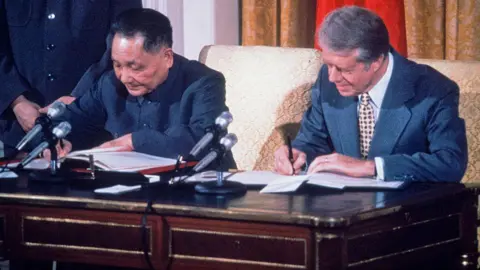 How China's Five Year Plans have changed the world Getty Images Chinese leader Deng Xiao Ping and US President Jimmy Carter signing an agreement for cooperation between China and the United States on science and technology, Washington, DC, January 1979.