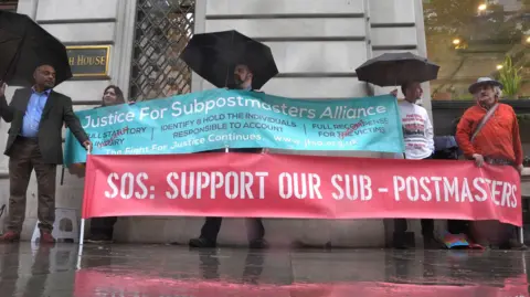 All Post Office Horizon victims entitled to free legal advice for first time PA Media Campaigners outside Aldwych House, central London, where the Post Office Horizon IT inquiry is taking place - they are holding up two banners, a blue one with the text Justice for subpostmasters alliance - and a second red one with SOS: Support our Sub-postmasters written on it