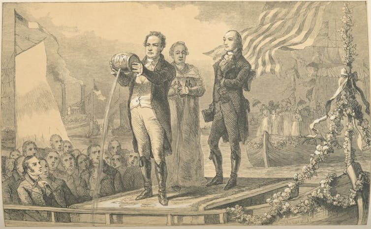 How a ‘big ditch’ transformed America’s economy, culture and even religion A faded black-and-white illustration of men in formal 18th-century clothing standing in front of a crowd as one pours a stream of water from a small barrel.