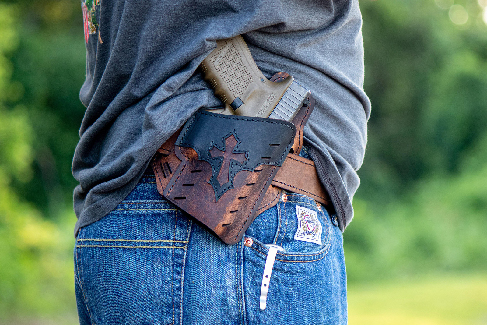 webRNS Bible Gun Holster Cross1 'In Guns We Trust' challenges white evangelicals to rethink their alliance with firearms