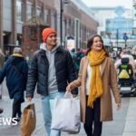 Woman volunteers at the Blackpool foodbank that helped her