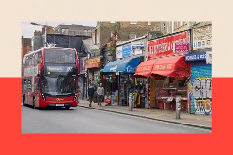 An image of Rye Lane, with a bus and shops