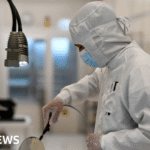 Multiple explosions shake a mosque in an Indonesian high school and injure 54