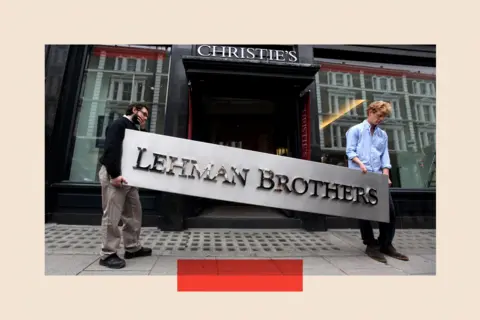 Getty Images Two people outside Christie's auction house manoeuvre the Lehman Brothers corporate logo