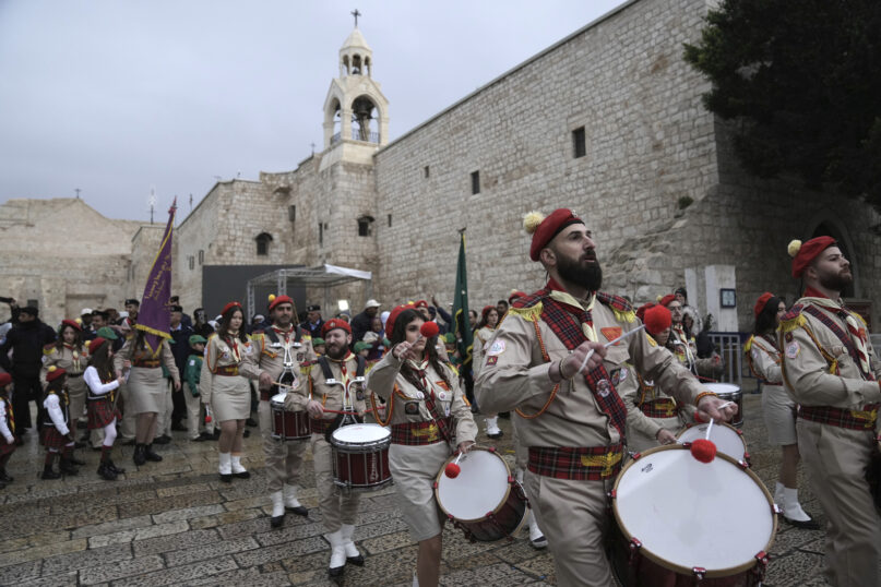 AP23006279384991 Christmas — and hope — return to Bethlehem after two somber years