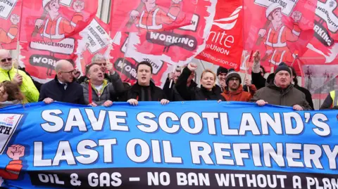 PA Media Protesters demonstrating outside Grangemouth after the closure of the plant was announced.