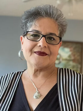 vertRNS Pilar Perez1 Churches deliver Christmas to immigrants detained, deported and in hiding