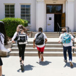 Minnesota church protest leader Nekima Levy Armstrong arrested, say federal officials