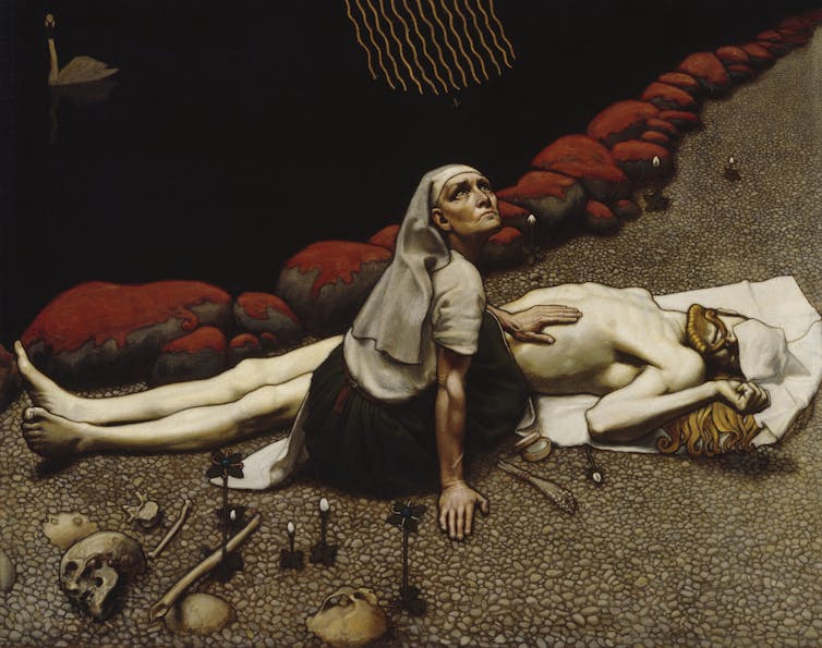 A woman with her hair in a kerchief stares up toward the sky as she sits near a pale, thin young man laid out on a riverbank.