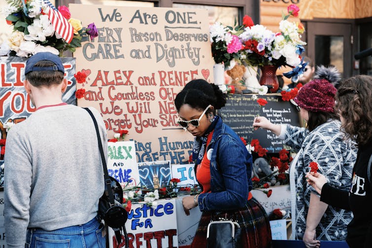 Minneapolis united when federal immigration operations surged – reflecting a long tradition of mutual aid People pay respects to Alex Pretti and Renee Good.