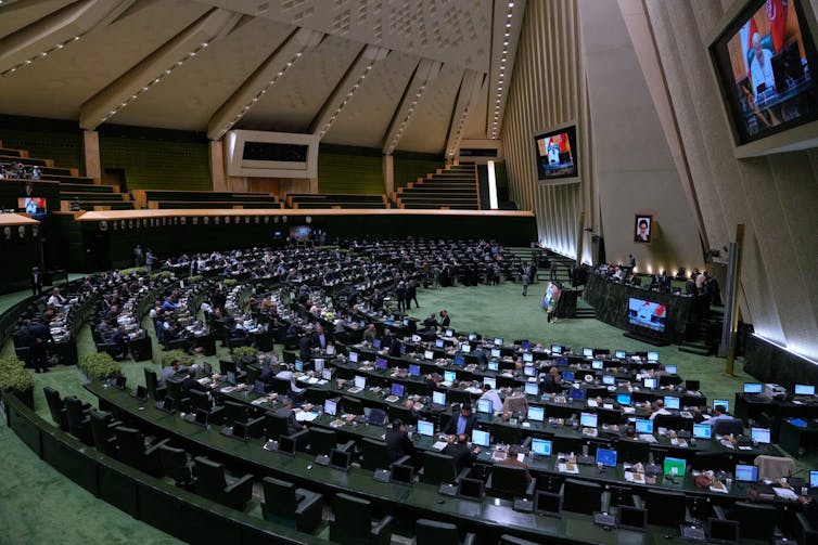 A wide angle photo of a political body and its permanent seats.